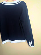 Black Chanel-Style Cardigan with White Trim